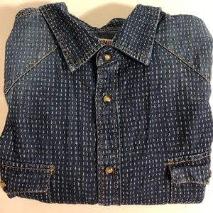 Patterned denim snap shirt.